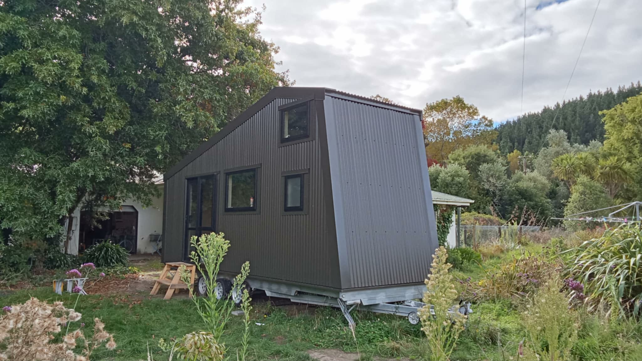 TopNotch Roofing wall cladding project with dark corrugated cladding